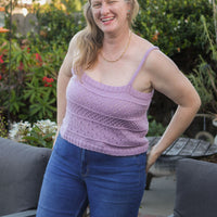 Heather Walpole wearing the lavender hand-knit Clear Skies Tank top made with Ewe Ewe Yarns Fluffy Fingering merino wool.