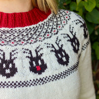 Reindeer Sweater, a Christmas colorwork yoke sweater knitting pattern in Ewe So Sporty