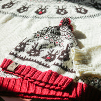 Reindeer Sweater, a Christmas colorwork yoke sweater knitting pattern in Ewe So Sporty