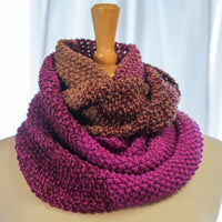 Close-up of the Color Theory Cowl seed stitch infinity scarf showing the ombre color shift