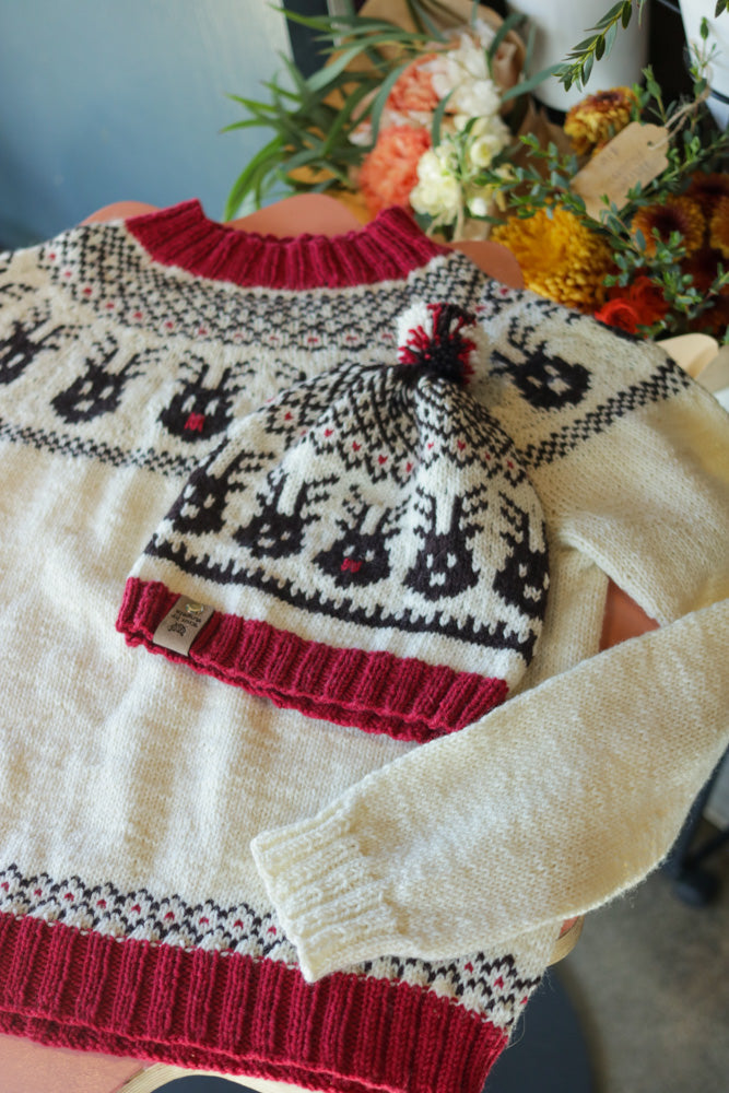 Reindeer Sweater, a Christmas colorwork yoke sweater knitting pattern in Ewe So Sporty