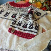 Reindeer Sweater, a Christmas colorwork yoke sweater knitting pattern in Ewe So Sporty