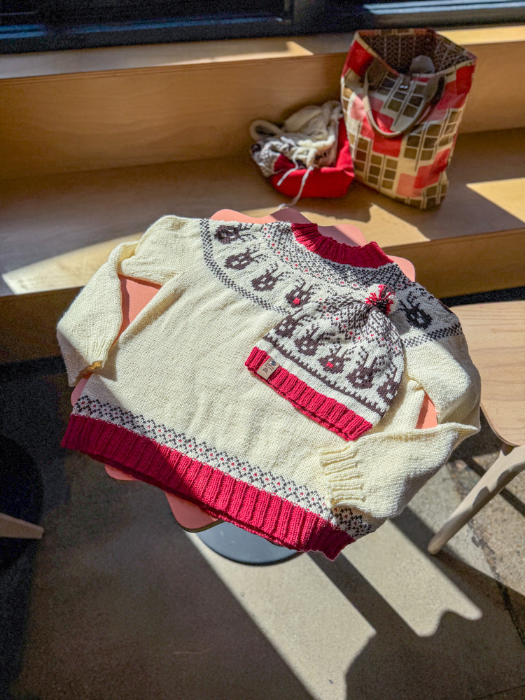 Reindeer Sweater, a Christmas colorwork yoke sweater knitting pattern in Ewe So Sporty