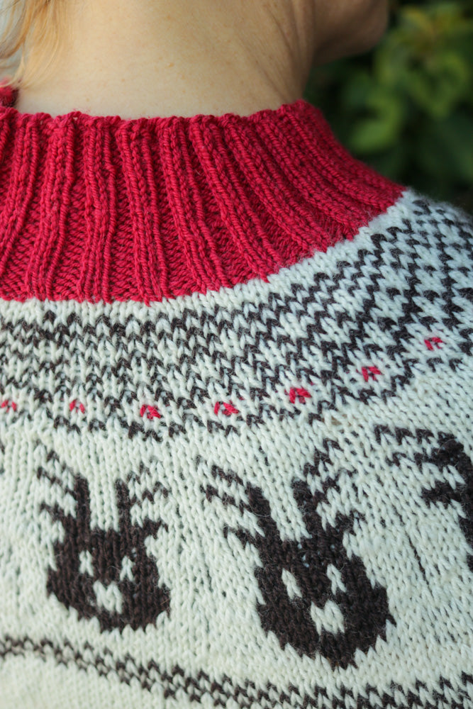 Reindeer Sweater, a Christmas colorwork yoke sweater knitting pattern in Ewe So Sporty