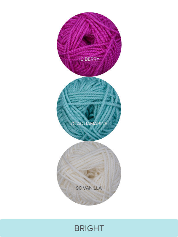 Color Theory Cowl yarn kit in the Bright colorway: Berry, Aquamarine, and Vanilla Ewe So Sporty merino yarn
