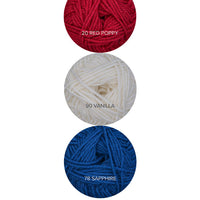 Color Theory Cowl yarn kit in the Patriotic colorway: Red Poppy, Vanilla, and Sapphire Ewe So Sporty merino yarn