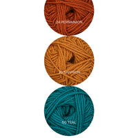 Color Theory Cowl yarn kit in the Changing Seasons colorway: Persimmon, Saffron, and Teal Ewe So Sporty merino yarn