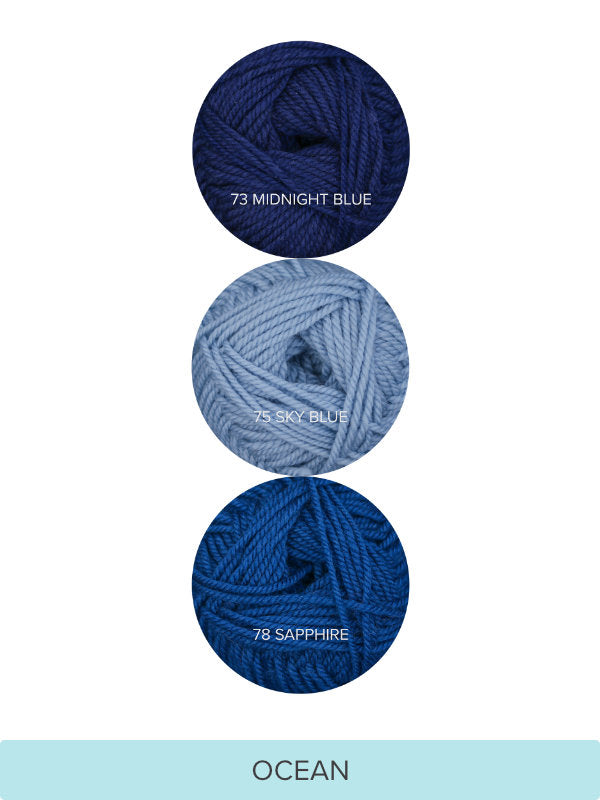 Color Theory Cowl yarn kit in the Ocean colorway: Midnight Blue, Sky Blue, and Sapphire Ewe So Sporty merino yarn