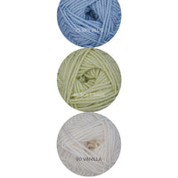 Color Theory Cowl yarn kit in the Light colorway: Sky Blue, Soft Sage, and Vanilla Ewe So Sporty merino yarn